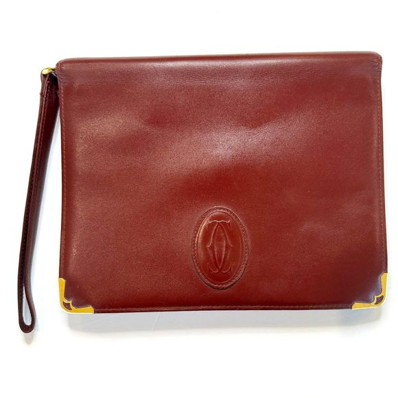 Cartier Handbags - CARTIER Burgundy Bordeaux Leather Clutch Purse Bag - Authentic